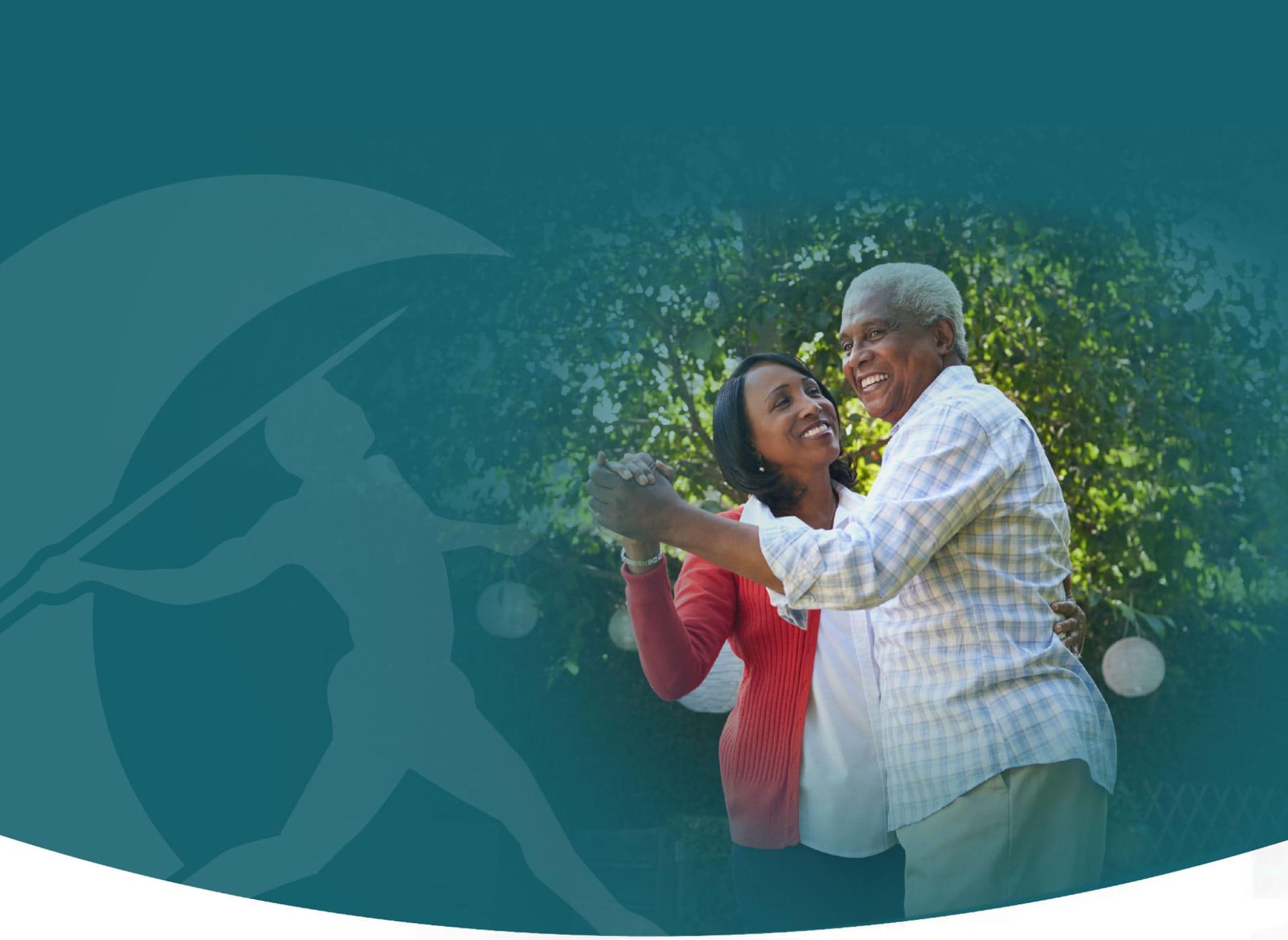 older couple dancing outside